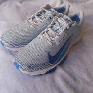 Nike Air Zoom Infinity Tour 2 golf shoe in a light blue and white colorway.